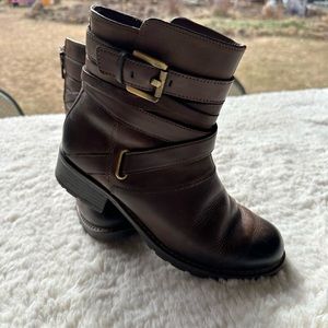 In Great condition. Clarks, brown leather boots. With straps and buckles.